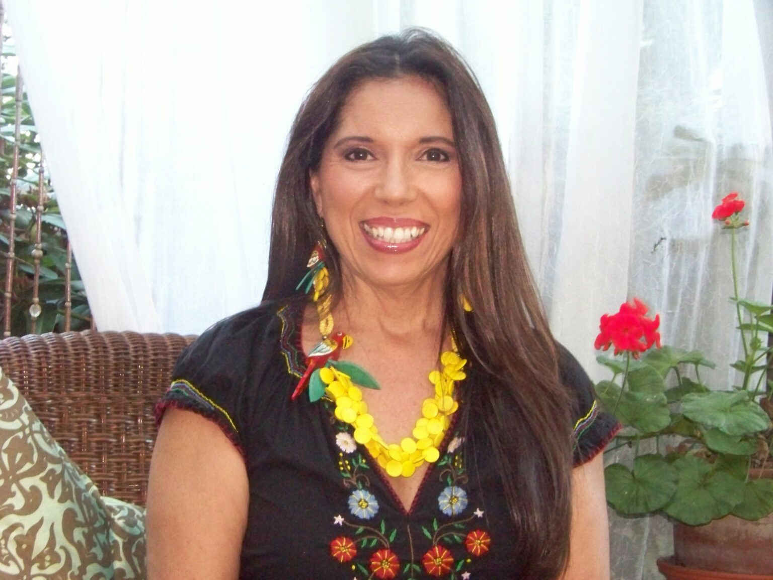 “Original Salsa Garcia brand photo featuring Patricia with early product display, taken in 2013.”