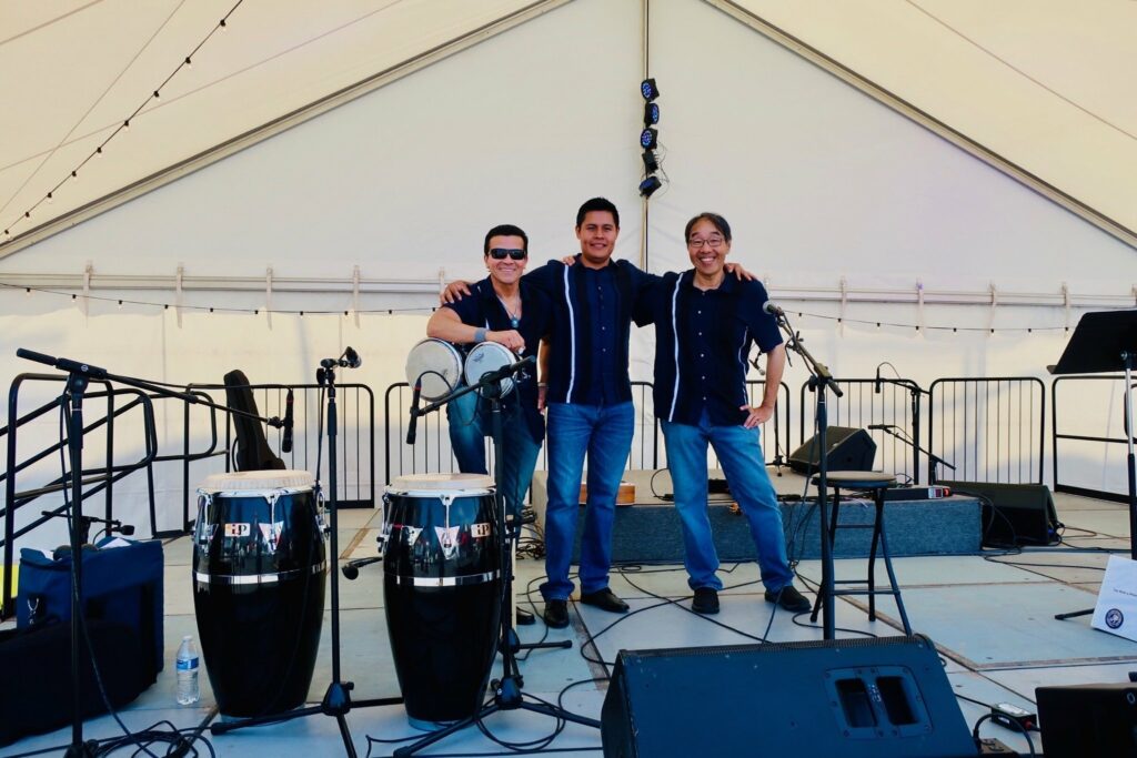 Promotional image for Trio Ritmo y Romance, an entertainment act at The Saturday Market.